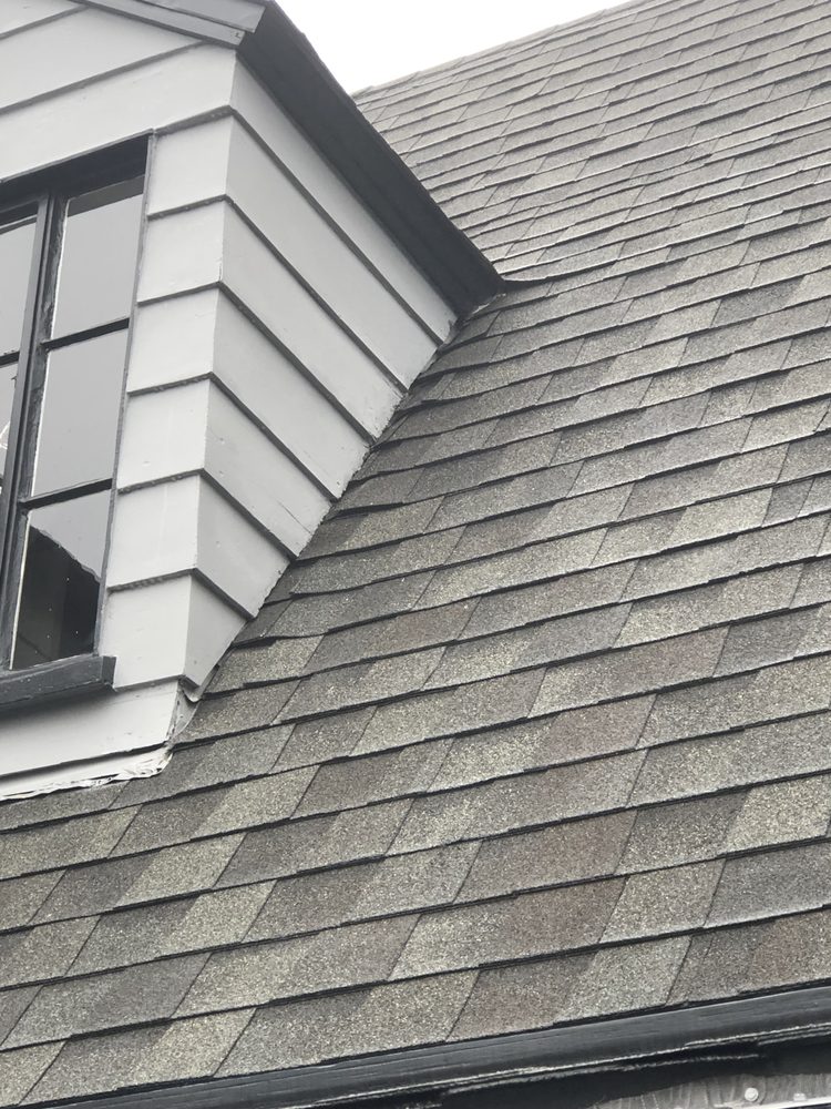 Slide of Collins Roofing