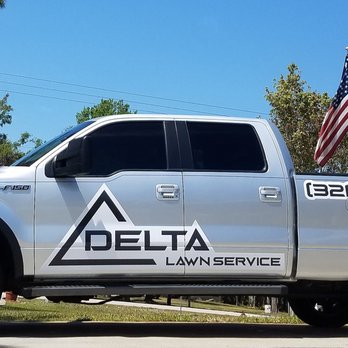 Delta Lawn Service - a truck parked in front of a house - Lawn Services Near Me Delta Lawn Service - a truck parked in front of a house - Lawn Services Near Me