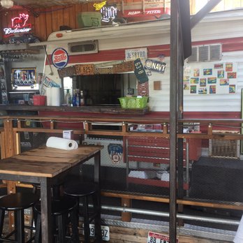 A Little BBQ Joint - Outside bar area is unique and has plenty of shaded spots too. - Barbeque Near Me - Independence, Missouri
