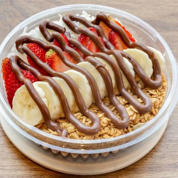 Baya Bar - Acai & Smoothie Shop - a banana, strawberries, and granola - Juice Bars & Smoothies Near Me - Brooklyn, New York Baya Bar - Acai & Smoothie Shop - a banana, strawberries, and granola - Juice Bars & Smoothies Near Me - Brooklyn, New York