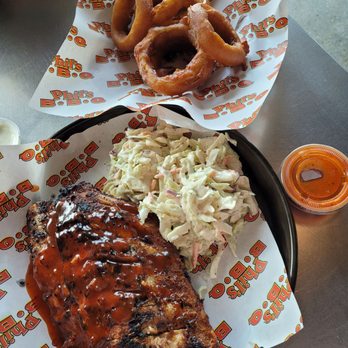 Phil's BBQ - Baby back ribs, coleslaw and onion rings. - Barbeque Near Me - San Diego, California Phil's BBQ - Baby back ribs, coleslaw and onion rings. - Barbeque Near Me - San Diego, California