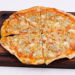Café Cubana - Quatro Queso Pizza
4 kinds of cheese: Mozzarella, Cheddar, Feta & Blue Cheese