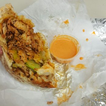 Falafel King - So good, digged in without a snapshot. I present to you a half eaten Shawarma Sandwich with no tomato or cucumber + spicy sauce on the side. - Sushi Bars Near Me - Atlanta, Georgia Falafel King - So good, digged in without a snapshot. I present to you a half eaten Shawarma Sandwich with no tomato or cucumber + spicy sauce on the side. - Sushi Bars Near Me - Atlanta, Georgia