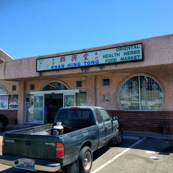 Khan Hing Tong - a pickup truck parked in front of a business - Grocery Near Me - Sacramento, California