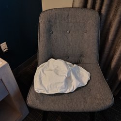 Archer Hotel Florham Park - What the heck is this? Left on my chair after cleaning (?). It's pretty clear- the cleaning folks aren't paying attention.