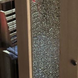 The glass shattered after a regular sauna session. I got on Yelp to see that the same thing happened to two other people.