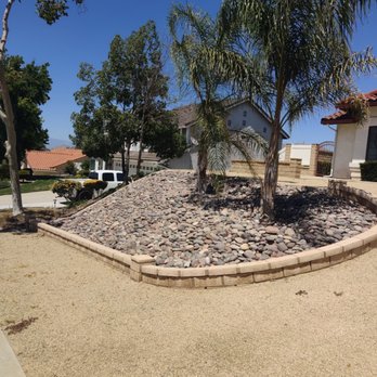 Sure Cut Landscape Services - Another hand set slope, decomposed granite,small wall,curbing between property line. - Landscaping Near Me - Riverside, California Sure Cut Landscape Services - Another hand set slope, decomposed granite,small wall,curbing between property line. - Landscaping Near Me - Riverside, California