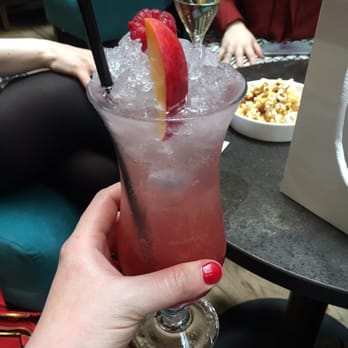 Belles in the Basement at Malmaison - Delicious fruity mocktail and newly manicured red nails - Local Flavor Near Me - Glasgow, GLG
