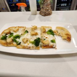 Bistro 212 - Broccoli chicken Alfredo flat bread