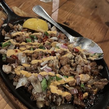 Tiki On 18th - Spicy pork sisig - Tiki Bars Near Me - Washington, DC, District of Columbia Tiki On 18th - Spicy pork sisig - Tiki Bars Near Me - Washington, DC, District of Columbia