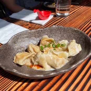 Dumpling Home - Pork Dumplings with Sesame Sauce and Red Chili Oil - Dim Sum Near Me - San Francisco, California Dumpling Home - Pork Dumplings with Sesame Sauce and Red Chili Oil - Dim Sum Near Me - San Francisco, California