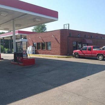 Fast Trax - a man filling up his car at a gas station - Convenience Stores Near Me - Rogers, Arkansas Fast Trax - a man filling up his car at a gas station - Convenience Stores Near Me - Rogers, Arkansas