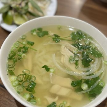 Pho Saigon Pasteur - Pho Ga (chicken pho) with fresh vegetables on the shared plate. - Vietnamese Near Me - Alhambra, California Pho Saigon Pasteur - Pho Ga (chicken pho) with fresh vegetables on the shared plate. - Vietnamese Near Me - Alhambra, California