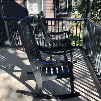 The Outlook Lodge - Rocking Chairs on the Patio of the Main Lodge - Outlook Lodge - Guest Houses Near Me - Green Mountain Falls, Colorado