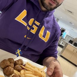Meatballs, fries and gravy on the side