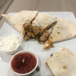 Concourse B Restaurant In Holiday Inn - Quesadilla add Chicken $8.00 plus $5.00 for the chicken.