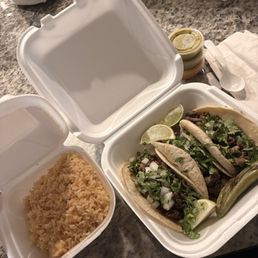 3 steak tacos with a side of rice 3 steak tacos with a side of rice