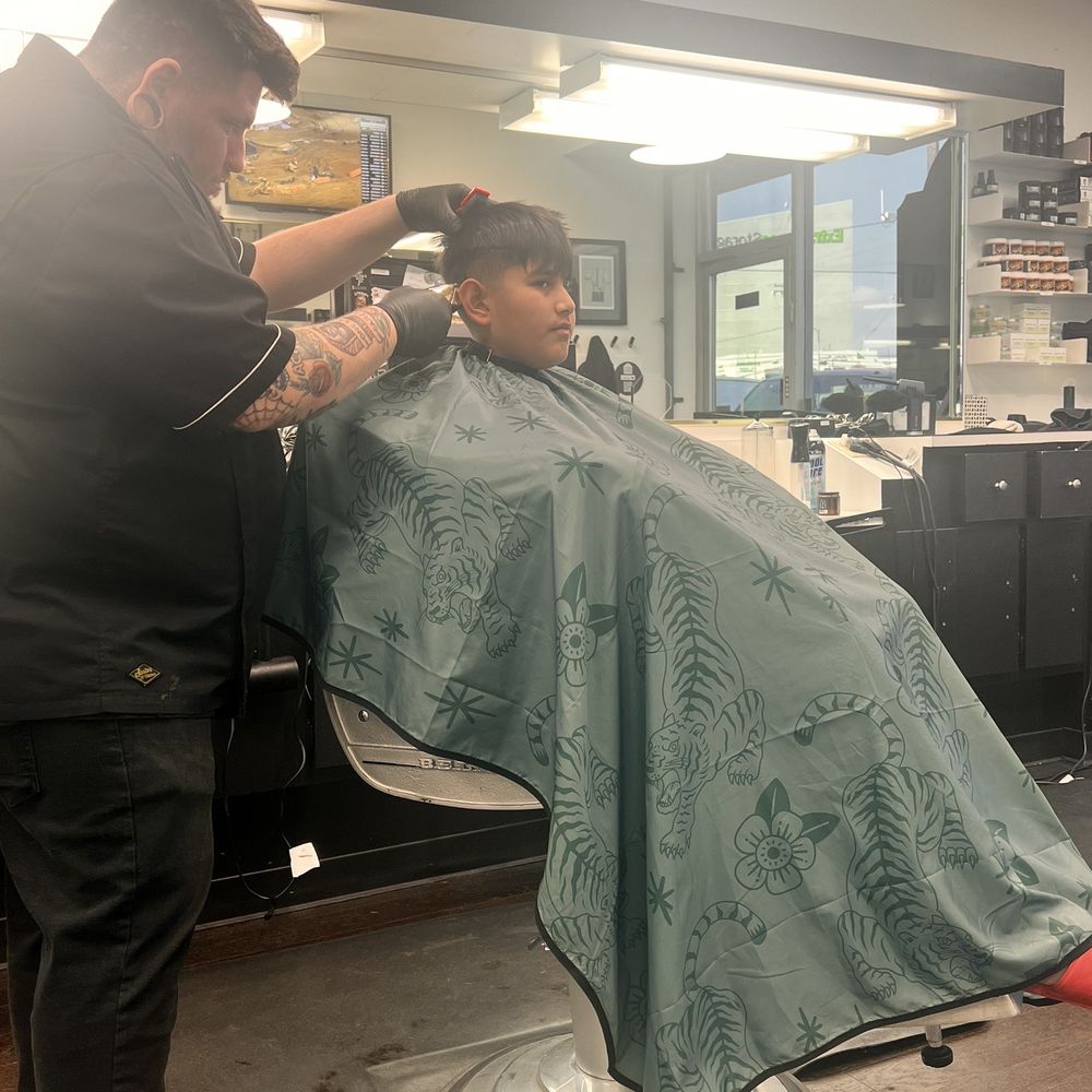 Jacob getting his haircut by Ezra Jacob getting his haircut by Ezra