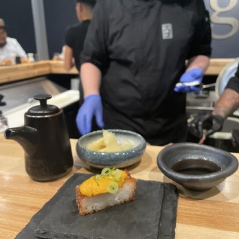 Sugo Hand Roll Bar - Uni, Crispy rice and micro cilantro - Sushi Bars Near Me - Seattle, Washington Sugo Hand Roll Bar - Uni, Crispy rice and micro cilantro - Sushi Bars Near Me - Seattle, Washington