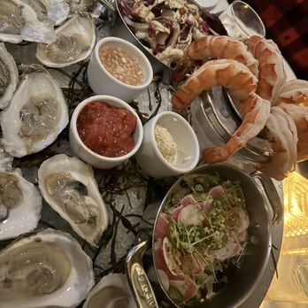 The Palm - Charlotte - Seafood platter with Oysters in the 1/2 shell Calamari Jumbo shrimp Fresh tuna - Steakhouses Near Me - Charlotte, North Carolina