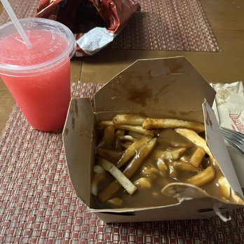 Queues de Castor - Frosted red lemonade & poutine (too much gravy) - Desserts Near Me - Mont-Tremblant, Quebec