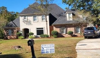 Slide of Crescent City Roofing