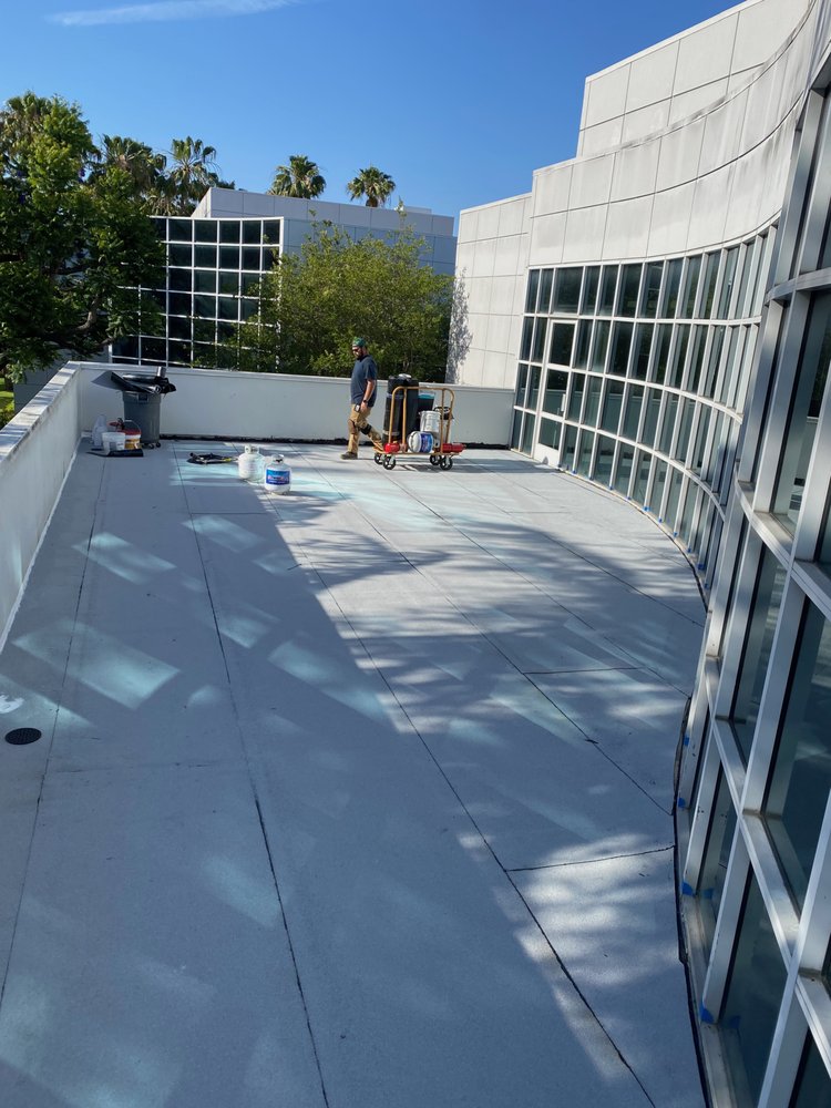 Slide of Ruiz Roofing