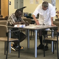 Tender Living Care - James and Donald putting together a puzzle