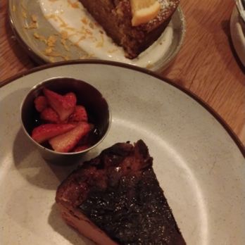 Boqueria Seaport - Chocolate Cheesecake and Olive Oil Cake - Spanish Near Me - Boston, Massachusetts Boqueria Seaport - Chocolate Cheesecake and Olive Oil Cake - Spanish Near Me - Boston, Massachusetts
