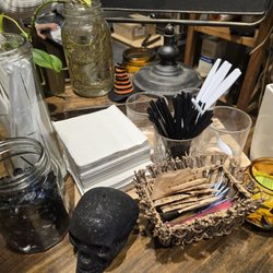 True North Coffee House - Coffee bar set up no cream, no spices to add by yourself.  ask barista