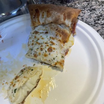 Cosmos Pizza - Looks like stuffed pizza to me?? - Pizza Near Me - Corolla, North Carolina