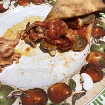 Taglio Pizza - Floppy sloppy slice (Burrito Style) - Pizza Near Me - Mineola, New York