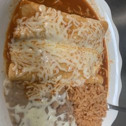 C and T's Restaurant - Chicken enchiladas with rice and beans