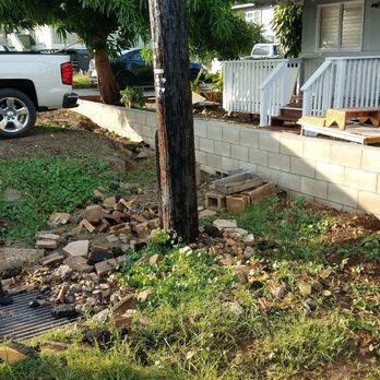 Complete Masonry - gravel and substrate eroding down along the wall - Masonry/Concrete Near Me Complete Masonry - gravel and substrate eroding down along the wall - Masonry/Concrete Near Me