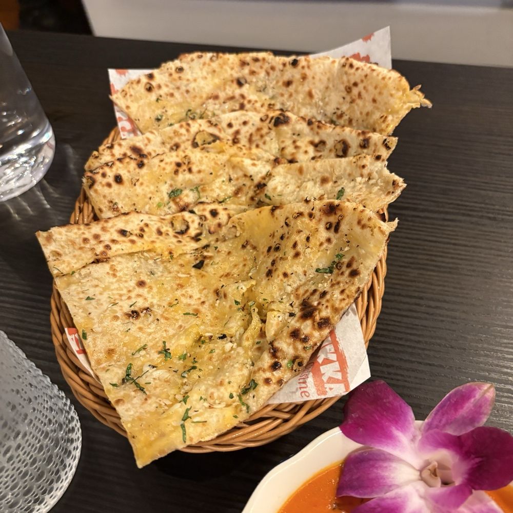 Ticca Tikka Indian Cuisine - Cheesy Naan with Garlic - Indian Near Me - Oceanside, California Ticca Tikka Indian Cuisine - Cheesy Naan with Garlic - Indian Near Me - Oceanside, California