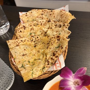 Ticca Tikka Indian Cuisine - Cheesy Naan with Garlic - Indian Near Me - Oceanside, California Ticca Tikka Indian Cuisine - Cheesy Naan with Garlic - Indian Near Me - Oceanside, California