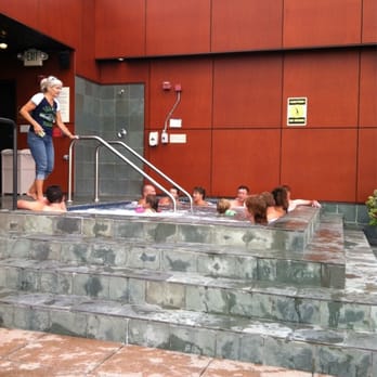 Silver Cloud Hotel - Seattle Stadium - Kids with floaters in a cold hot tub on a sunny Labor Day weekend. - Hotels Near Me - Seattle, Washington Silver Cloud Hotel - Seattle Stadium - Kids with floaters in a cold hot tub on a sunny Labor Day weekend. - Hotels Near Me - Seattle, Washington