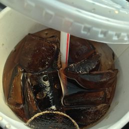 a plastic container filled with ice and jelly a plastic container filled with ice and jelly