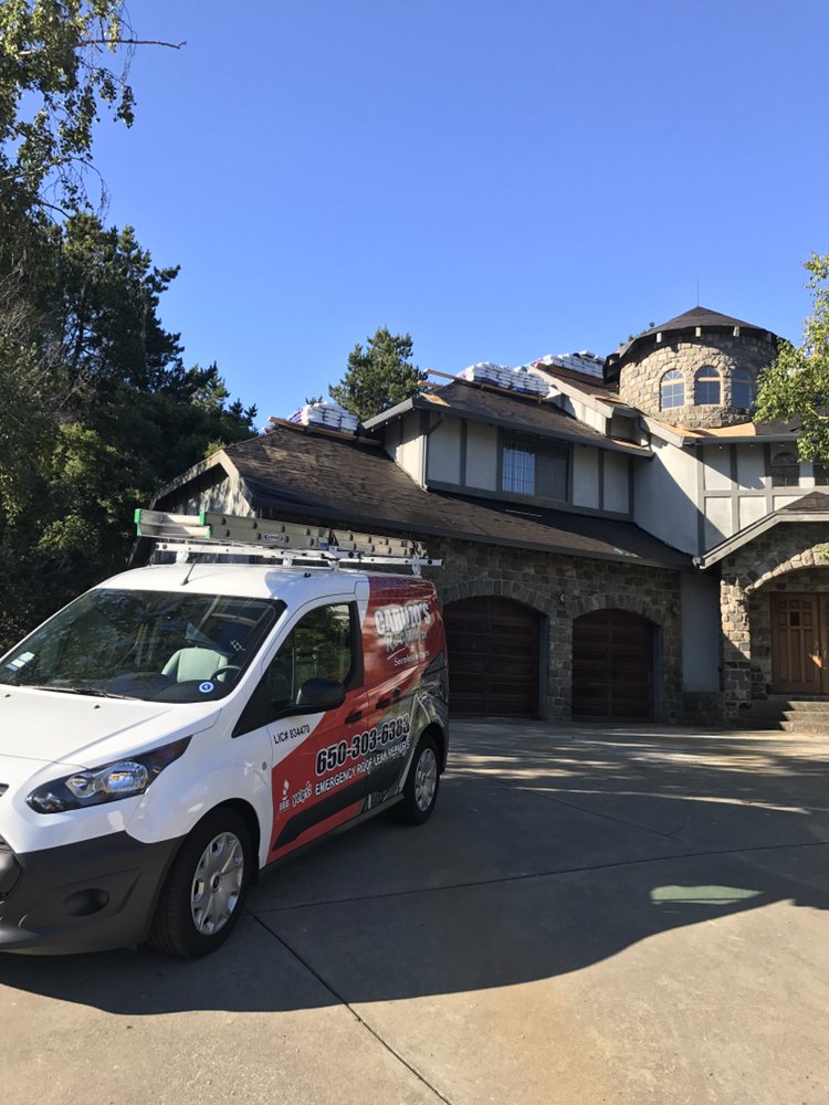 Slide of Caruzo's Roofing Contractors