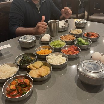 Tofu Plus - Vegetable side dishes and eggs they brought to crack into our stew - Korean Near Me - Cupertino, California
