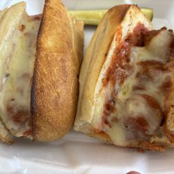Famous Subs & Pizza - Large meatball sub. Excellent. The bread is amazing. Crunchy on the outside and soft on the inside. Not soggy from the sauce