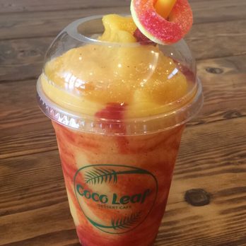 Coco Leaf - Mangonada, a hint of sweet/sour from the mango, w/ a taste of salty/spicy from the chamoy sauce. Topping it off with edible tamarind straw! - Coffee & Tea Near Me - Boston, Massachusetts