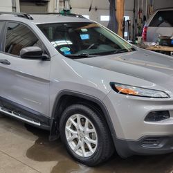Pacesetter Truck and Auto Accessories - Nice shiny Jeep! Beautiful inside and out, they did the tint years ago, still looks great.