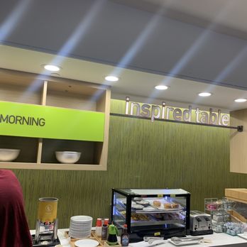 Home2 Suites by Hilton St. Augustine I-95 - Waffle, pastry, egg, breakfast sandwich, will, cereal, and juice station - Hotels Near Me - St. Augustine, Florida Home2 Suites by Hilton St. Augustine I-95 - Waffle, pastry, egg, breakfast sandwich, will, cereal, and juice station - Hotels Near Me - St. Augustine, Florida