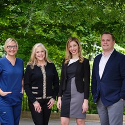 West Cobb Periodontics and Implant Dentistry - Dr. Braswell and Dr. Kramer with Daniel and Alaina
