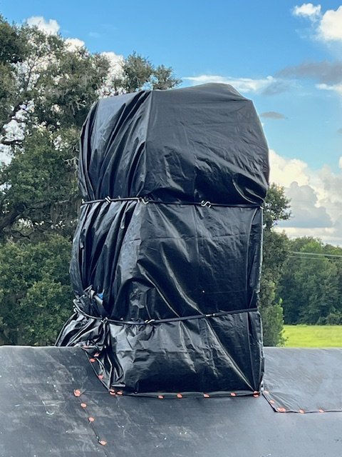 Slide of Blue Tarp Express