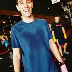9Round Kickboxing Fitness - This happy 9Rounder shows his love for 9Round even through his sweat!