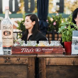 Liquid Catering - Several Liquid Catering bartenders behind a bar