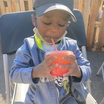TriniJam BK - Complimentary toddler sized slushy on a sunny day. - Trinidadian Near Me - Brooklyn, New York