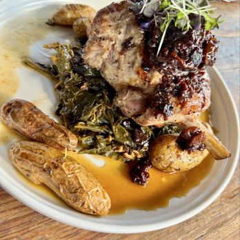 The Exchange Pub + Kitchen - 08.28.25 Pork Chop - braised greens, herb fingerling potatoes, cherry bacon chutney - Gastropubs Near Me - New Albany, Indiana